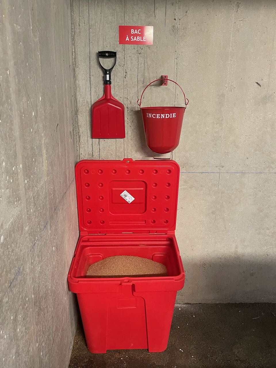 Installation de bac à sable dans un parking